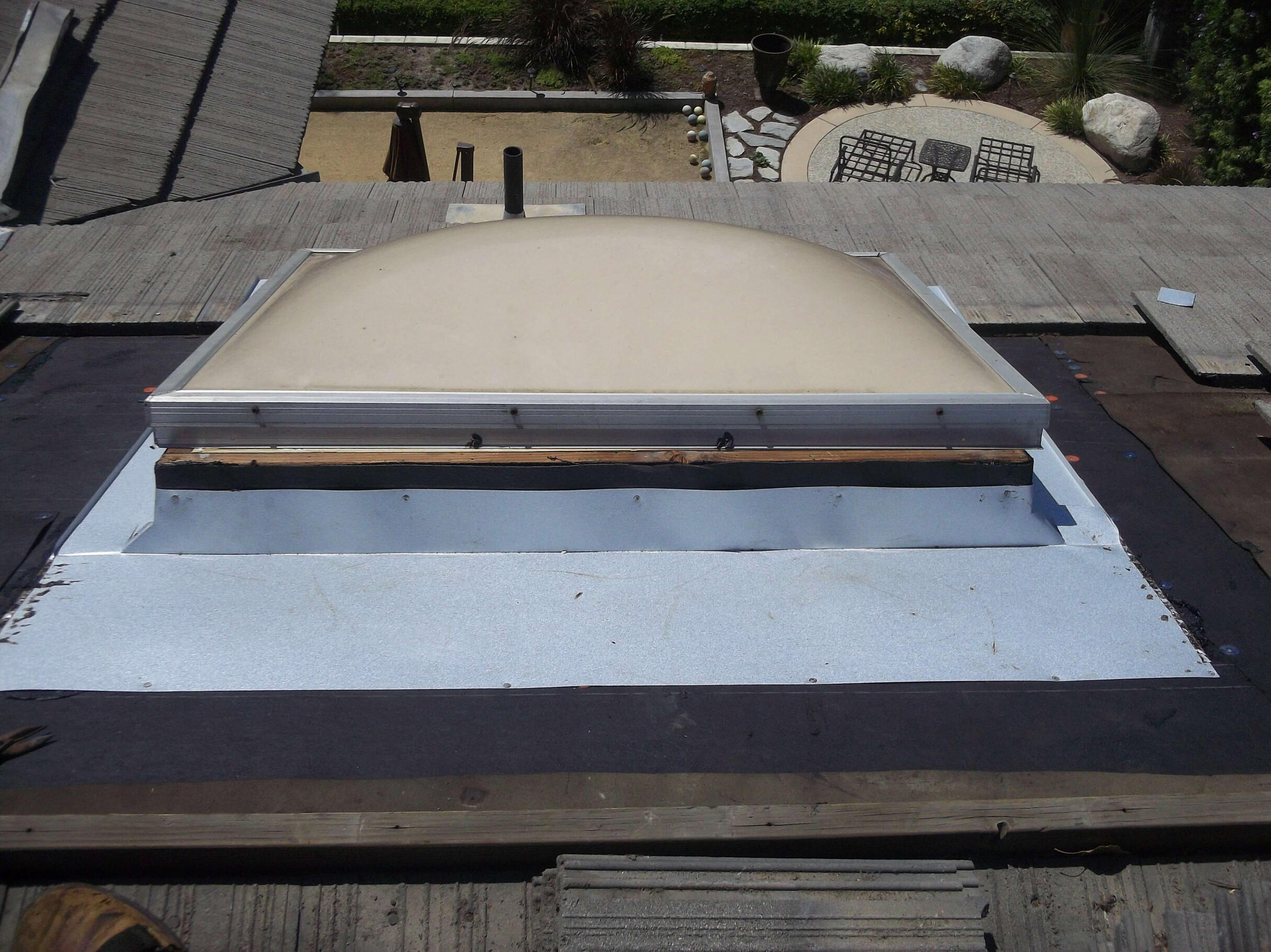 repairs of a leaking skylight in Aliso Viejo flashing replacement on a aluminum skylight