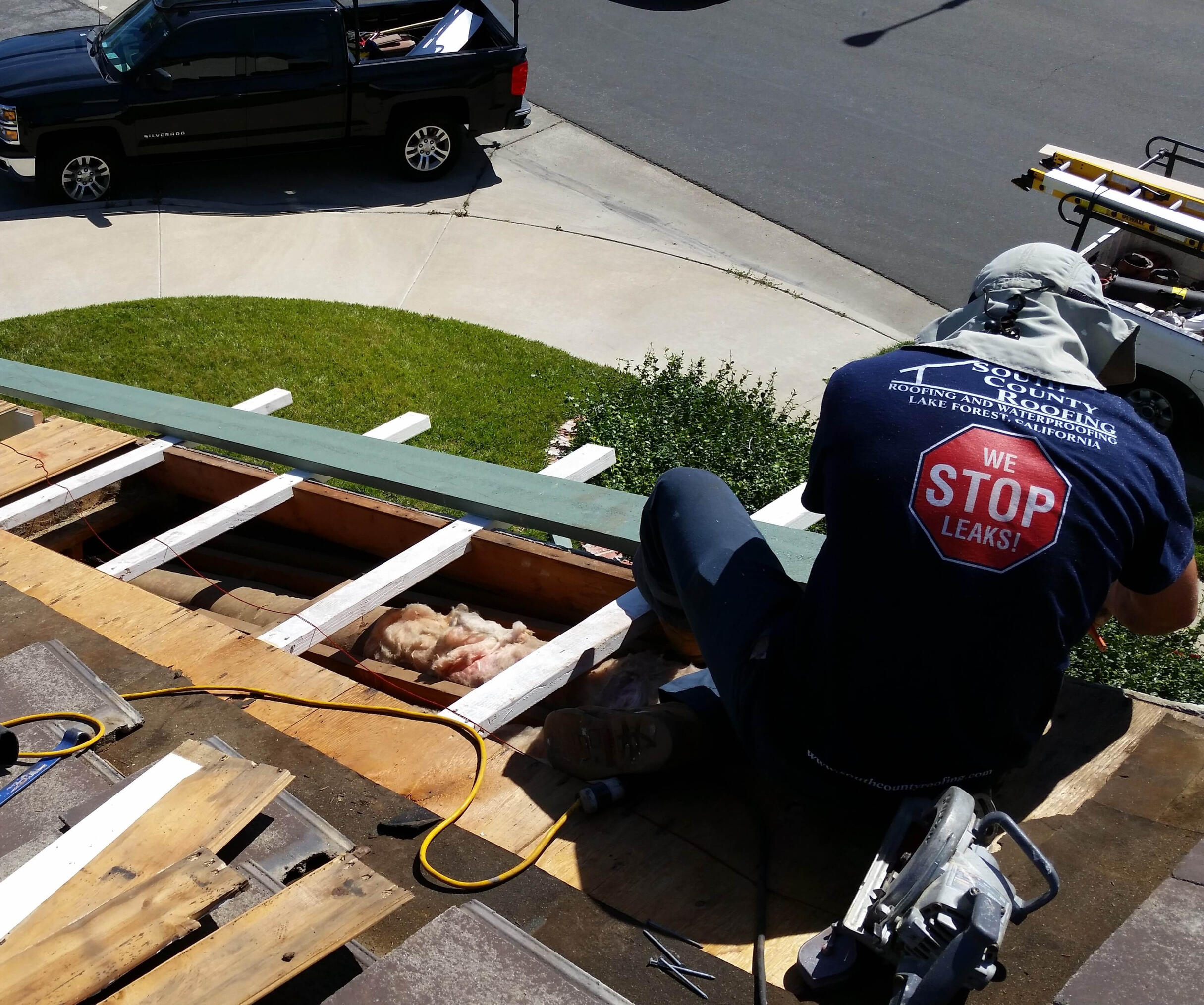 roofer cutting fascia boards